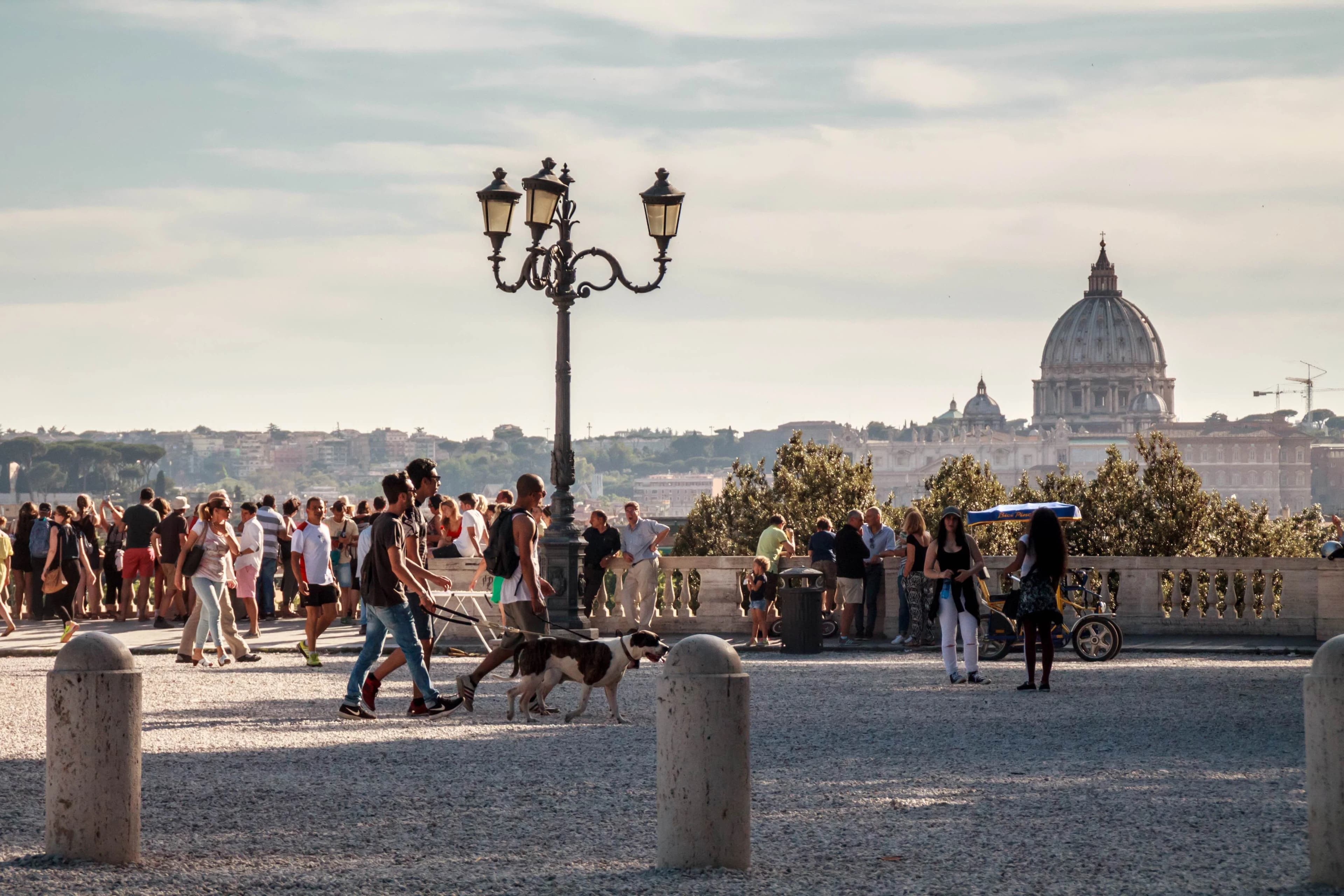 View from the Pincio terrace over Piazza del Popolo toward the dome of St. Peter's at sunset